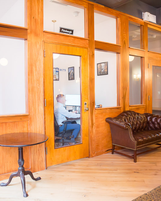 Open seating lounge area at Fulton Commons coworking space Pittsburgh